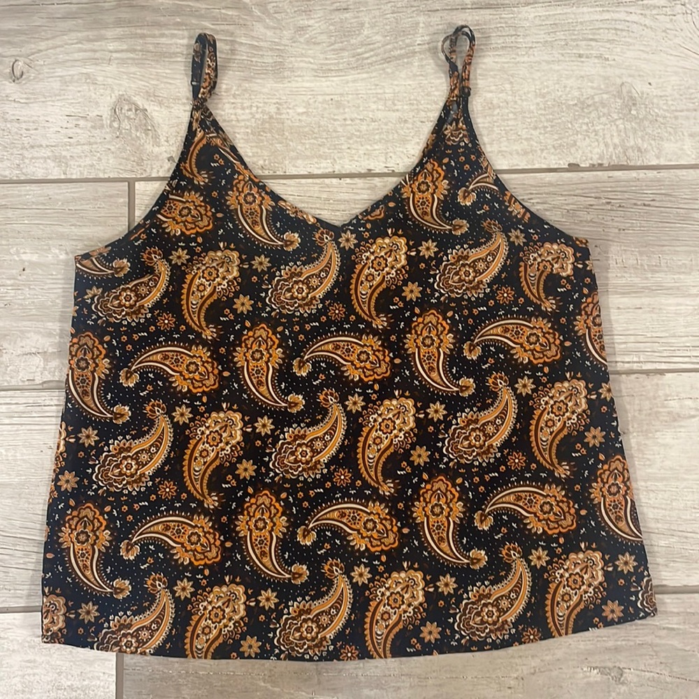 Navy tank /sleeveless blouse.